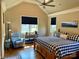 Bedroom boasts a ceiling fan, hardwood floors, and natural light at 6111 Gold Springs Way, Denver, NC 28037