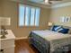 Cozy bedroom with a ceiling fan, window shutters, and soothing color palette at 6111 Gold Springs Way, Denver, NC 28037