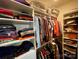 Walk-in closet with custom shelving and ample storage space for clothes and accessories at 6111 Gold Springs Way, Denver, NC 28037