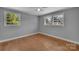 Bright bedroom features wood floors, neutral walls, and natural light at 647 Black E St, Rock Hill, SC 29730