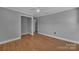 Bedroom features wood floors, neutral walls, and two doorways at 647 Black E St, Rock Hill, SC 29730