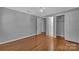 Bedroom featuring wood floors, neutral walls, two doorways and a closet at 647 Black E St, Rock Hill, SC 29730