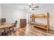 Bedroom featuring a bunk bed, desk, ceiling fan, and dresser at 7360 Winery Ln, Charlotte, NC 28227