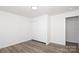 Bedroom featuring luxury vinyl plank flooring, closet, and white trim at 1018 Union St, Maiden, NC 28650