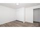 Bedroom features wood-look flooring, ample closet space, and neutral paint at 1018 Union St, Maiden, NC 28650