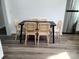 Bright dining area features a modern table set and wood-look flooring at 1018 Union St, Maiden, NC 28650
