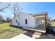 Renovated home features a charming facade, covered porch, and fresh landscaping, blending modern upgrades with curb appeal at 1018 Union St, Maiden, NC 28650