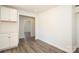 Neutral room with luxury vinyl plank flooring, white walls, and white trim at 1018 Union St, Maiden, NC 28650