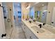 Elegant bathroom with double vanity, modern fixtures, and glass-enclosed shower at 1045 Northend Dr # 34, Charlotte, NC 28206