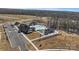 Aerial view of community pool, tennis courts, clubhouse and parking area at 1132 Meander Ln, Waxhaw, NC 28173