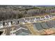 An aerial of a neighborhood showcasing a row of well-maintained houses at 1132 Meander Ln, Waxhaw, NC 28173