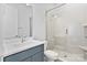 Modern bathroom featuring white tiles, chrome fixtures, and a seamless glass shower at 1132 Meander Ln, Waxhaw, NC 28173