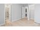 Bright bedroom featuring hardwood floors and access to bathroom and closet at 1132 Meander Ln, Waxhaw, NC 28173