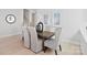 Dining room featuring a wooden table with upholstered chairs, modern decor, and light hardwood floors at 1132 Meander Ln, Waxhaw, NC 28173