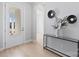 Bright foyer with glass door and a decorative console table at 1132 Meander Ln, Waxhaw, NC 28173