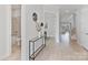 Bright foyer with hardwood floors, modern decor, and an open view into the living room and staircase at 1132 Meander Ln, Waxhaw, NC 28173