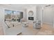 Bright living room featuring a modern fireplace, sliding glass doors to the outside, and hardwood floors at 1132 Meander Ln, Waxhaw, NC 28173