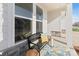 Cozy front porch with a stylish bench, colorful rug, and a view of the neighborhood at 1132 Meander Ln, Waxhaw, NC 28173