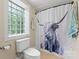 Unique bathroom with privacy window and custom shower curtain at 1363 John Cline Ct, Lincolnton, NC 28092