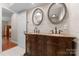 Elegant bathroom with a double vanity and granite countertops at 1363 John Cline Ct, Lincolnton, NC 28092