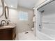 Well-lit bathroom featuring a double vanity and a shower-tub combo at 1363 John Cline Ct, Lincolnton, NC 28092