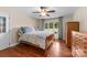 Comfortable bedroom with hardwood floors and a bright window view at 1363 John Cline Ct, Lincolnton, NC 28092