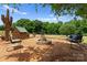 View of outdoor stone firepit with seating at 1363 John Cline Ct, Lincolnton, NC 28092