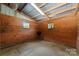 Clean horse stall with wood walls, ventilation windows, and comfortable flooring at 1363 John Cline Ct, Lincolnton, NC 28092