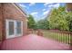 Wood deck with access to the house and overlooking the backyard at 1730 Sanridge Wind Ln, Charlotte, NC 28262