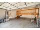 Spacious garage with a wooden loft and ample room for parking and storage at 1730 Sanridge Wind Ln, Charlotte, NC 28262