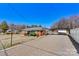 View of the home with gravel driveway, carport, small storage building and nice landscaping at 1802 Young Dr, Conover, NC 28613