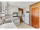 Functional kitchen with white cabinets, linoleum floors, and vintage-style appliances at 1802 Young Dr, Conover, NC 28613