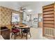 Retro kitchen featuring vintage wallpaper, linoleum flooring, wooden table and chairs at 1802 Young Dr, Conover, NC 28613