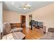 Bright living room with wood floors, furniture and a ceiling fan providing comfort and style at 1802 Young Dr, Conover, NC 28613