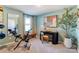 Bright home gym with an exercise bike, bench, desk and contemporary decor at 212 Laura Elizabeth Ln, Clover, SC 29710