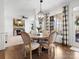Bright dining room features hardwood floors, a pendant light fixture, and great natural light at 604 Wisteria Walk Way, Fort Mill, SC 29715