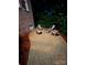 Outdoor fire pit with lots of adirondack chairs under the night sky, surrounded by greenery at 604 Wisteria Walk Way, Fort Mill, SC 29715