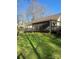 Back deck with a dark wood fence and a well-maintained lawn at 7144 Hunters Bluff Dr, Denver, NC 28037