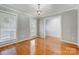 Dining room filled with natural light features hardwood flooring and neutral decor at 737 Sanside Dr, York, SC 29745