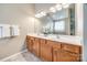 Double sinks and ample lighting make for a beautiful bathroom at 974 Platinum Dr, Fort Mill, SC 29708