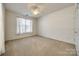 This bedroom features a ceiling fan and natural light at 974 Platinum Dr, Fort Mill, SC 29708