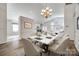 Bright and airy dining room with new floors, leading into a living area with a cozy fireplace at 974 Platinum Dr, Fort Mill, SC 29708