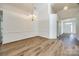 Spacious dining room featuring new floors, chandelier and neutral color scheme at 974 Platinum Dr, Fort Mill, SC 29708