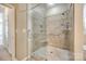 Shower with glass doors and multi-setting shower head at 974 Platinum Dr, Fort Mill, SC 29708