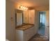 Bathroom with granite countertops, dual sinks, and ample cabinet space at 122 Mason Tanner Ct # 5, Rock Hill, SC 29730