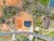 Aerial shot of a new build home with a newly constructed driveway and partially landscaped yard in a residential neighborhood at 1313 Gidney St, Shelby, NC 28150