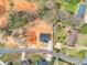 Aerial view of a new home featuring a freshly laid lawn and a driveway, complemented by a serene residential setting at 1313 Gidney St, Shelby, NC 28150