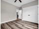 Comfortable bedroom with wood-look floors and view of closet doors creating a cozy atmosphere at 1313 Gidney St, Shelby, NC 28150