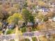 Residential street featuring well-kept homes with mature trees and green lawns at 2508 Bay St, Charlotte, NC 28205