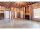 Unfinished basement space featuring open framing and a fireplace at 3334 Cloninger Rd, Dallas, NC 28034